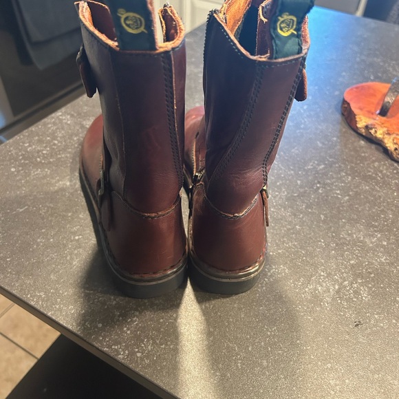 Born burgundy/reddish in color rising boot. - Picture 7 of 8